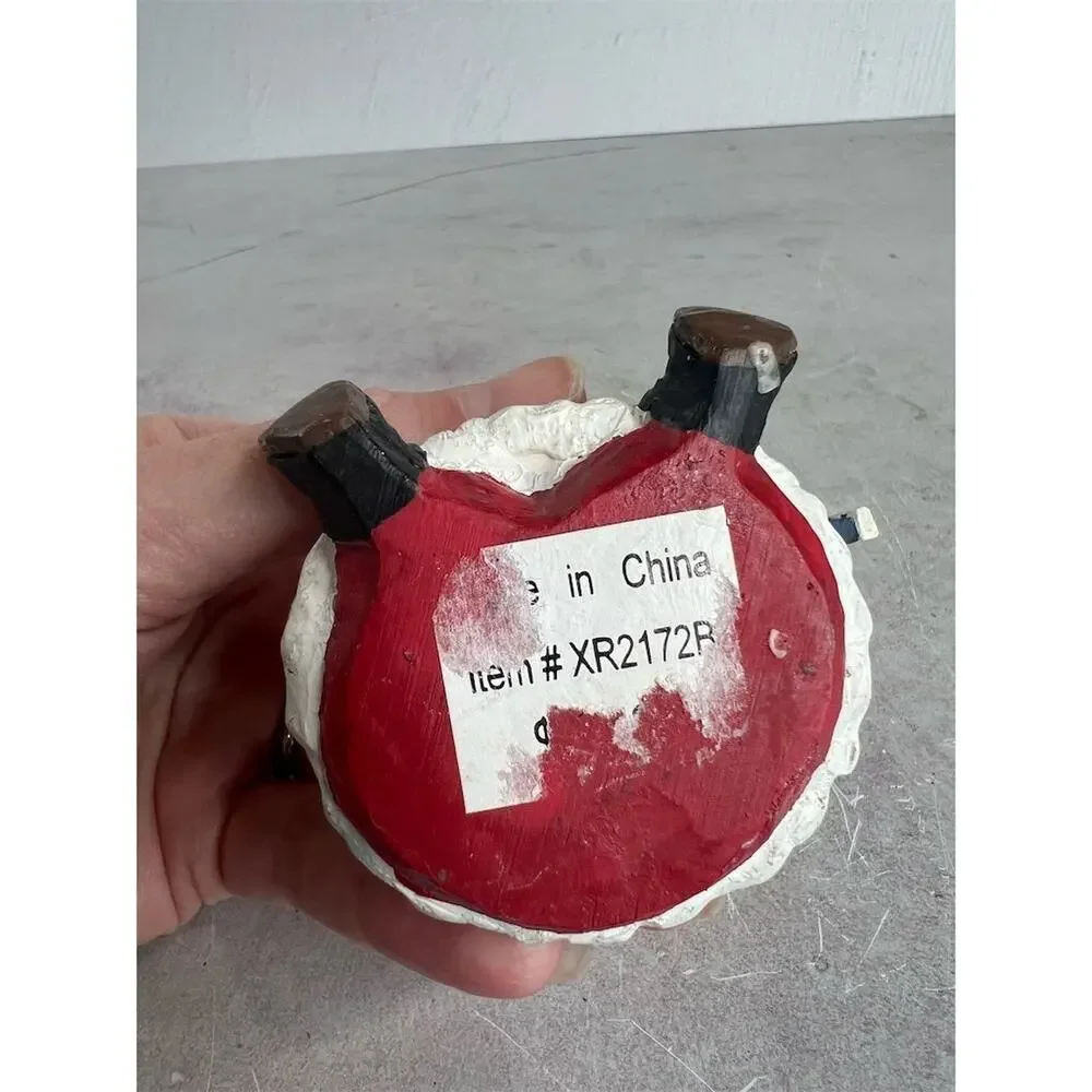A Berry Merry Christmas Santa Claus Figurine 3